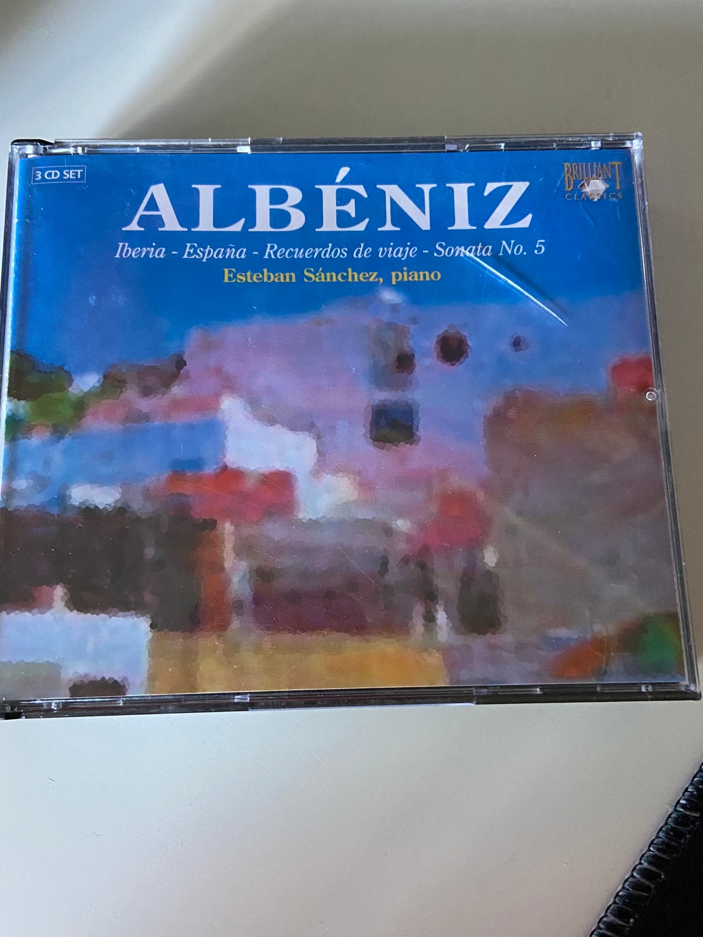 CD cover of Albéniz music with a painting of a landscape on a white background
