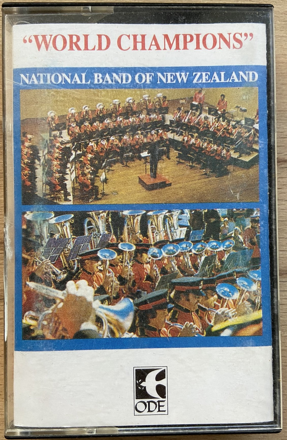 Cassette tape cover featuring the National Band of New Zealand with 'World Champions' text and ODE logo.